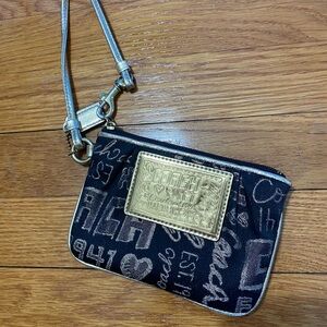 Coach Black and Gold Wristlet